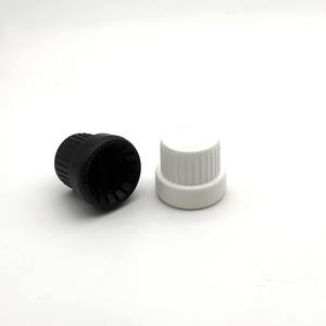 <span class=keywords><strong>Bouchon</strong></span> antivol <span class=keywords><strong>en</strong></span> plastique à grain grossier noir et blanc 18/410 avec <span class=keywords><strong>bouchon</strong></span> intérieur <span class=keywords><strong>en</strong></span> liège 1.0 pour flacon d'huile essentielle - Vente <span class=keywords><strong>en</strong></span> <span class=keywords><strong>gros</strong></span> - Product Image 1