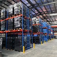 Étagère de stockage de palettes à charge lourde avec montants bleus et poutres orange pour entrepôt d'usine et centre de distribution