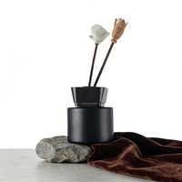 Diffuseur d'arômes en verre rond noir mat de 100 ml pour l'aromathérapie avec couvercle