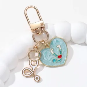 Porte-clés en forme de flacon de médicament en forme de cœur de dessin animé, série hôpital, pendentif mignon, cadeau idéal pour les médecins et les infirmières, bijoux faits à la main - Product Image 6