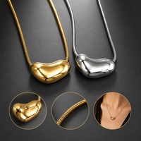 Collier pendentif minimaliste en forme de haricot, fin et brillant, avec chaîne serpent, idéal pour assortir aux tenues féminines