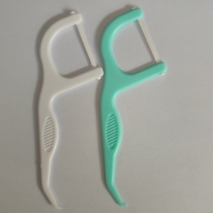 <span class=keywords><strong>Fil</strong></span> <span class=keywords><strong>dentaire</strong></span> en PTFE en gros avec support de nettoyage des dents à picots lisses et sans poils pour tous - Product Image 1