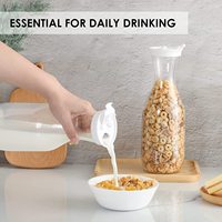 Carafes en plastique transparent de 700ml avec couvercles blancs à bascule