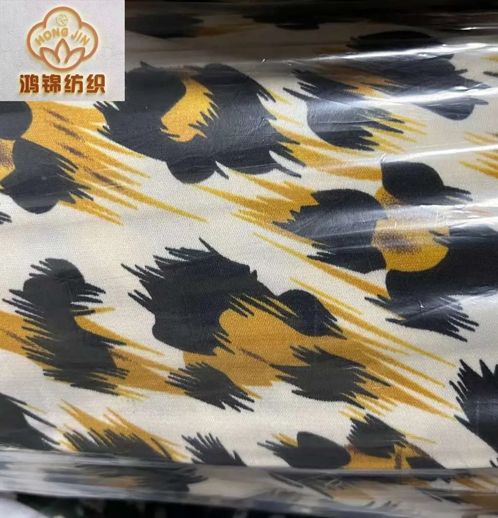 Wholesale good quality 100% polyester poka print leopard design cheap price stock fabric