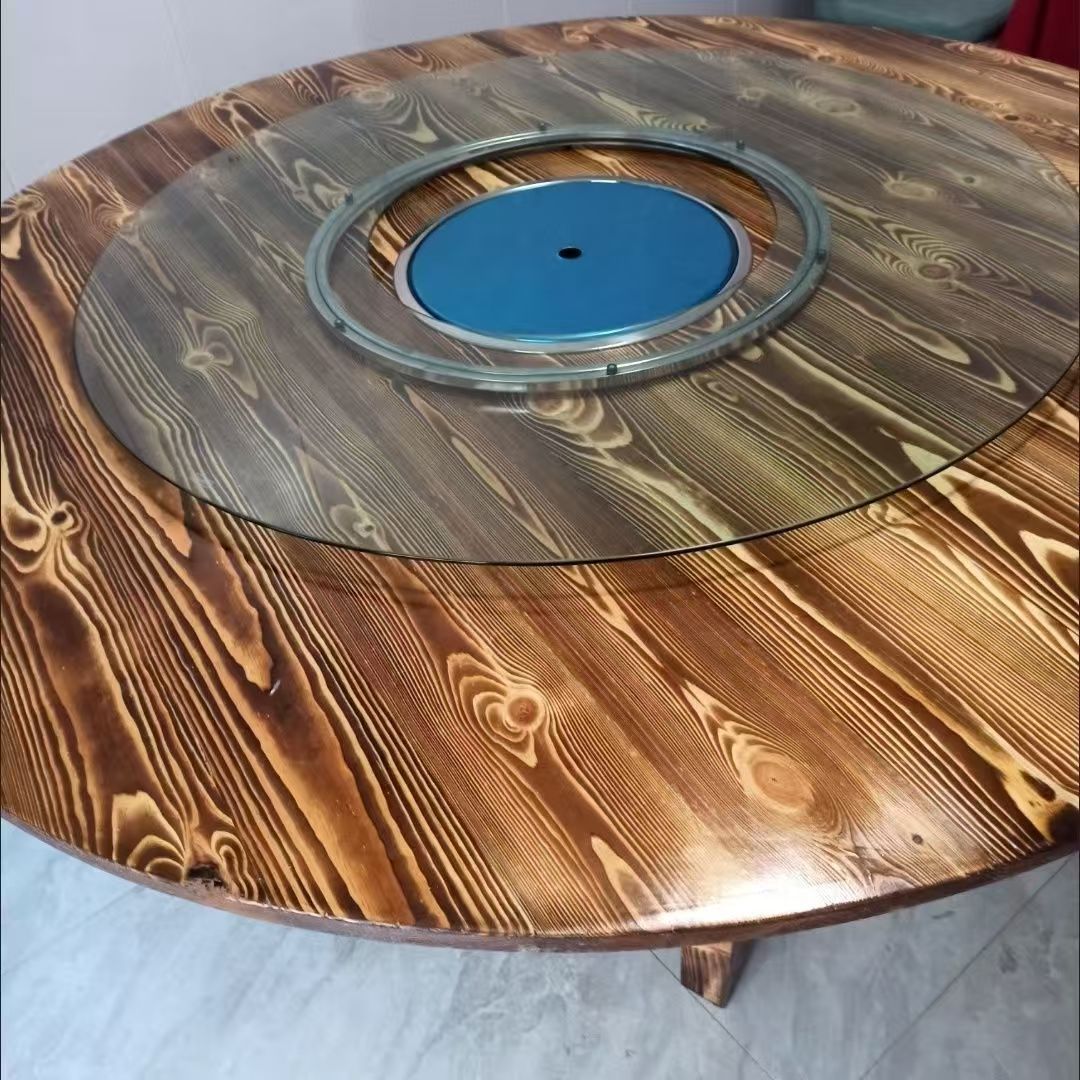 Table ronde de 1,3 mètre avec plaque à induction encastrée et plateau tournant.