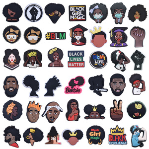 Vente en gros Ornements de sandale personnalisés Décoration de chaussures pour hommes Accessoires sabots noirs Charmes de chaussures noirs en caoutchouc PVC souple pour sabots - Product Image 1