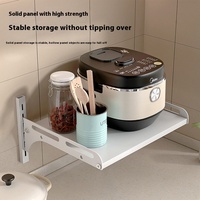 Étagère murale multifonctionnelle en métal sans poinçon pour la cuisine, le four à micro-ondes, les assaisonnements et les bouteilles.