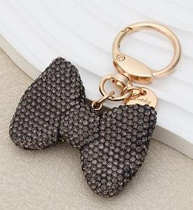 Porte-clés <span class=keywords><strong>de</strong></span> sac à nœud en métal et diamant Pendentif <span class=keywords><strong>de</strong></span> <span class=keywords><strong>clé</strong></span> <span class=keywords><strong>de</strong></span> <span class=keywords><strong>voiture</strong></span> en alliage <span class=keywords><strong>de</strong></span> mode en forme d'arc Porte-clés légers Charme <span class=keywords><strong>de</strong></span> sac en diamant en gros - Product Image 6