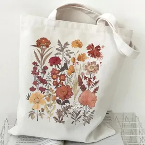 Bolsos de compras florales con diseño de luna para mujer, bolsos de lona de gran capacidad, estilo casual para estudiantes, bolso de hombro con diseño de plantas, bolsos de mano con diseño de flores silvestres para mujer - Product Image 1