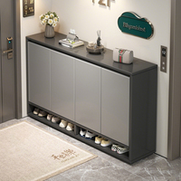 Meuble à chaussures moderne pour entrée avec étagères réglables et porte-parapluie latéral, unité de rangement compacte pour la maison et l'appartement.