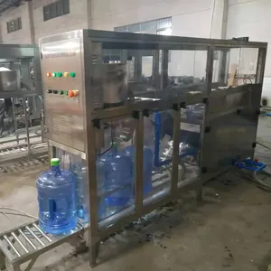 Type personnalisé 100BPH machine de remplissage de bouteilles de 5 gallons pour l'eau potable bouteille lavage remplissage machine de capsulage
