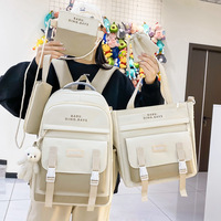 Ensemble de sacs à dos scolaires imperméables blancs tendance 5 pièces pour les élèves du collège, design mignon, capacité de 20 à 36 L, unisexe