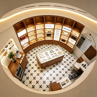 Magasin de vente au détail optique contemporain avec étagères ouvertes à niveaux et vitrines rondes éclairées