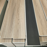 Revêtement de sol en vinyle SPC imitation bois imperméable avec système de clic pour salon, chambre et cuisine