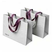 Sacs de shopping en papier kraft recyclables de luxe avec logo personnalisé, poignées en ruban, impression UV pour l'emballage de vêtements, vente en gros