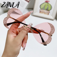 Amour coeur en forme de diamant sans cadre lunettes De soleil femmes 2025 doux papillon conception lunettes fête lunettes De soleil en plein air Oculos De Sol