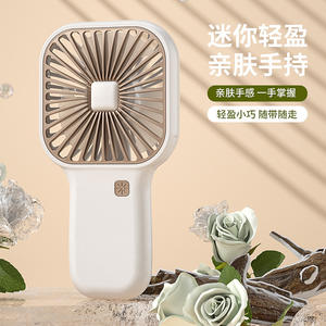พัดลมมือถือขนาดเล็กแบบพกพาพร้อมมอเตอร์ไร้แปรงถ่านแบบชาร์จไฟได้พลังงาน USB สำหรับใช้ในสำนักงานกลางแจ้งสีขาวสีชมพูสีเขียว - Product Image 1