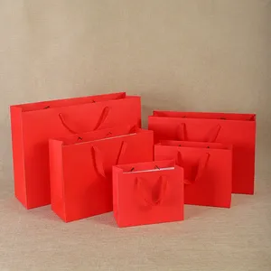 Wholesale <b>Red</b> Kraft Paper Gift Bags with Handles for Wedding Birthday Parties and Shopping Elegant Packaging - Product Image 3