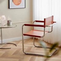 Fauteuil minimaliste de style nordique, chaise incurvée en tube d'acier inoxydable, chaise de salle à manger en similicuir