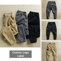 Celana kargo ketat untuk pria, celana kargo model Retro pinggang elastis terlaris, celana kancing tengah pinggang gaya kasual