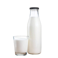 Bouteille de lait en verre transparent de qualité alimentaire avec bouchon à vis d'une capacité de 250ml 500ml 1000ml pour l'emballage d'aliments pour bébés et de bonbons