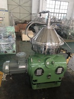 Centrifugeuse à disques à décharge automatique haute efficacité pour l'extraction de lanoline et le traitement de la graisse de laine