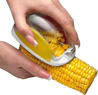 Nouveaux outils de cuisine Gadgets de cuisine uniques Éplucheur de maïs magique Trancheuse à légumes Éplucheurs Décapant pour l'épi