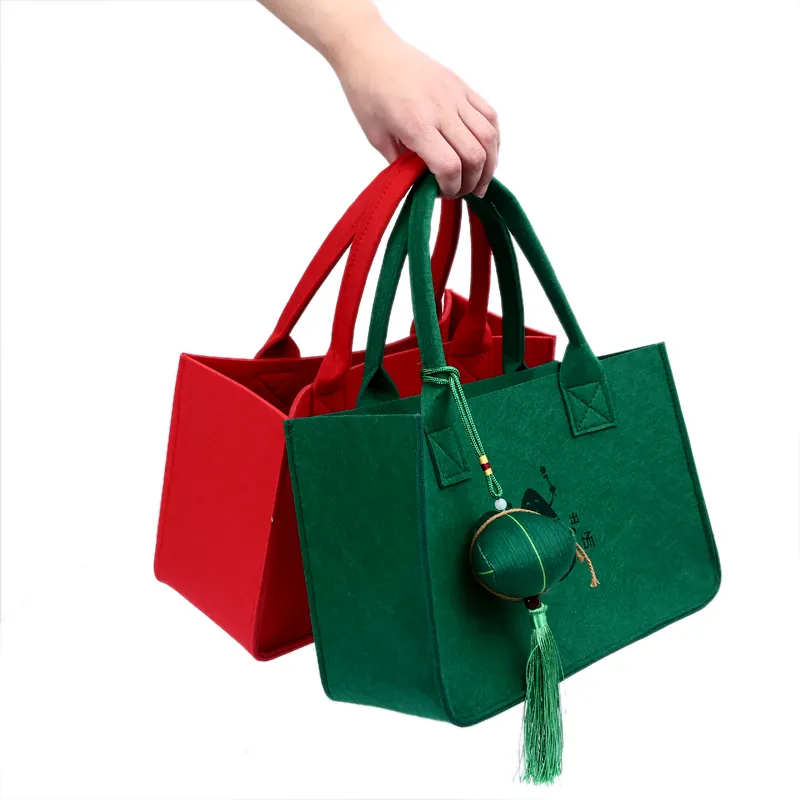 La fabbrica accetta l'organizzatore della borsa di acquisto della borsa dei regali di tote del feltro su ordinazione
