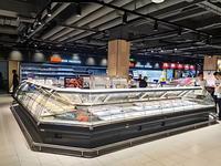 Vitrine réfrigérée commerciale en acier inoxydable avec verre incurvé pour charcuterie, viande crue et aliments cuits