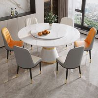 Table à manger de luxe moderne avec plateau en pierre et base en métal de haute qualité pour salons, hôtels et restaurants