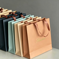 Sac cadeau en carton ivoire commercial, recyclable, personnalisable, avec impression de marque, capacité de 6 à 9 kg