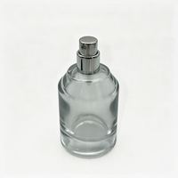 Flacon pulvérisateur de parfum en verre de luxe vide de 50 ml, rond, à épaule oblique, avec capuchon à bille noir