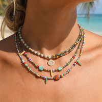 Collier tendance en gros plaqué or avec pendentif œil bleu en acier inoxydable pour femme