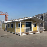 Module de logement portable préfabriqué à prix compétitif personnalisé Maison conteneur extensible à double aile de 40 pieds