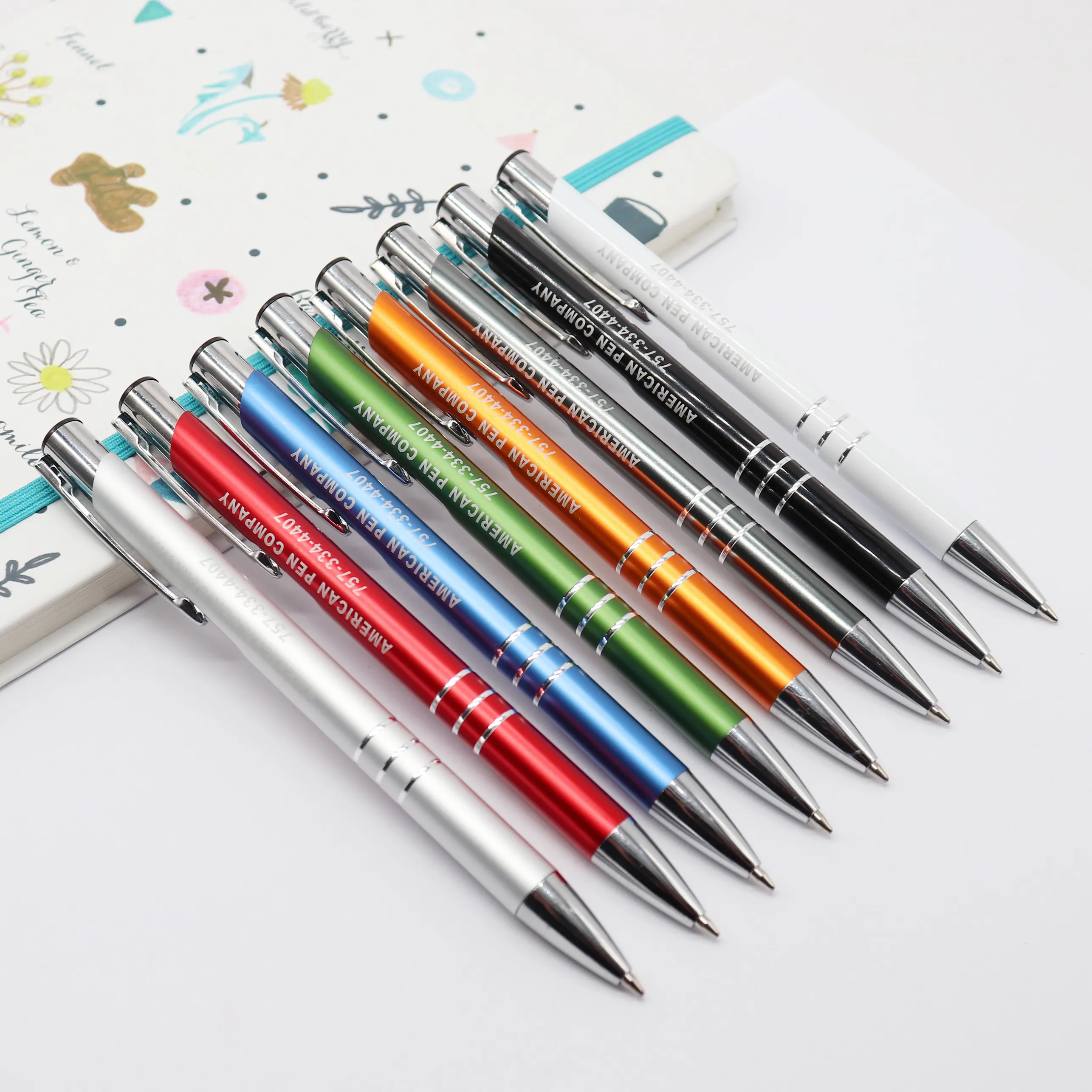 סין ייצור מקצועי יוקרה מתכתי קידום מכירות כדור עט צבעוני מתכת כדורי אישית עט עם לוגו עט