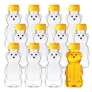 Bouteilles de miel en <span class=keywords><strong>plastique</strong></span> transparent de qualité <span class=keywords><strong>alimentaire</strong></span>, vides, à presser, 8oz 16oz 24oz, distributeur de miel en forme d'ours avec couvercle à clapet - Product Image 1