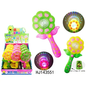 中国糖果糖果女孩玩具太阳花音乐闪光棒玩具与糖果在 12 个