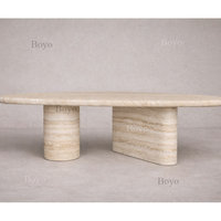 Table basse ovale en pierre naturelle massif, style mid-century moderne, en travertin