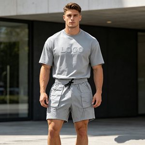 Conjunto de 500g para hombre, superventas, con camiseta de cuello redondo con relieve, ropa casual de verano, tejido de punto, 100% algodón, color liso, conjunto de dos piezas para hombre - Product Image 1