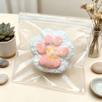 Jouet anti-stress en silicone souple en forme de patte de chat rose clair, jouet sensoriel à presser en forme de boule de riz, jouet alimentaire pour adolescents et adultes