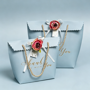 Custom Logo Scalloped Paper Gift Bags Wholesale With Cardboard Material Twine Handle And Ribbon Bow Premium Packaging - Product Image 1