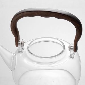 Tetera de vidrio de borosilicato alto con mango de madera, resistente al calor, para uso en el hogar y la oficina - Product Image 5