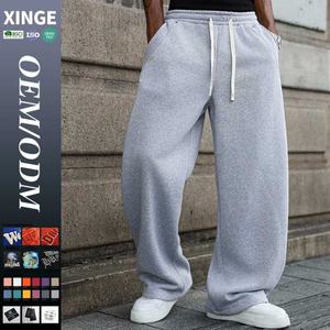 Pantalon cargo streetwear surdimensionné personnalisé pour homme, coupe décontractée et ample, avec broderies graphiques, poches tactiques et jambe large en toile - Product Image 1