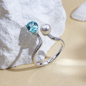 Anillo de oro de 18 quilates con dos piedras de aguamarina de laboratorio en forma de pera, modelo MSR-1633 de Messi Jewelry. - Product Image 2