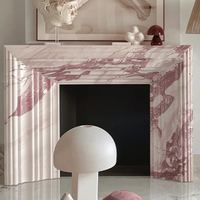 Cheminée en marbre rose naturel de style français moderne avec gravure artistique pour la décoration intérieure