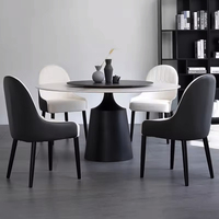 Leichter runder Luxus-Tisch aus Kohlenstoffs tahl mit minimalisti schem, modernem Haushalts-Esstisch mit kleinem High-End-Rock-Teller