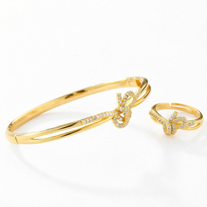 Ensemble de bijoux en cuivre plaqué or 18 carats avec nœud XOXO et zircon, bracelet et bague ajustables, ensemble cadeau pour mariage, fiançailles, fête, fait main - Product Image 1