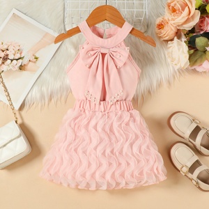 Completo due pezzi per bambina stile principessa: top con fiocco e <span class=keywords><strong>gonna</strong></span> in <span class=keywords><strong>tulle</strong></span> a strati, ideale per feste, matrimoni e uso quotidiano - Product Image 1