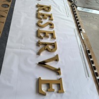 Lettres personnalisées en titane doré miroir de 30 mm d'épaisseur, en acier inoxydable 316, avec support en PVC, pour les devantures de magasins de luxe et les présentoirs de hall d'hôtel