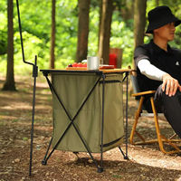 Table de camping ronde pliable compacte avec boîte de rangement, base trépied en aluminium durable, tissu imperméable, mobilier d'extérieur portable